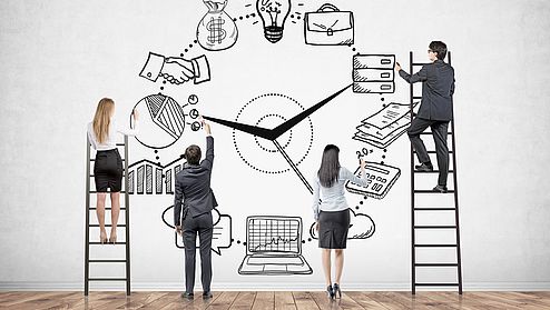 Business team on ladders, time management