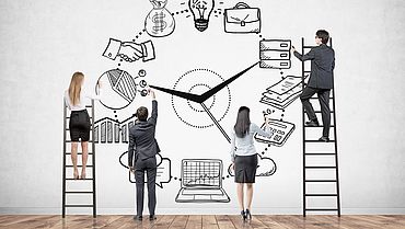 Business team on ladders, time management